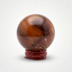 Carnelian Crystal Sphere with Wooden Stand
