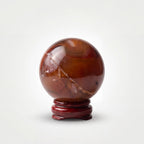 Carnelian Crystal Sphere with Wooden Stand