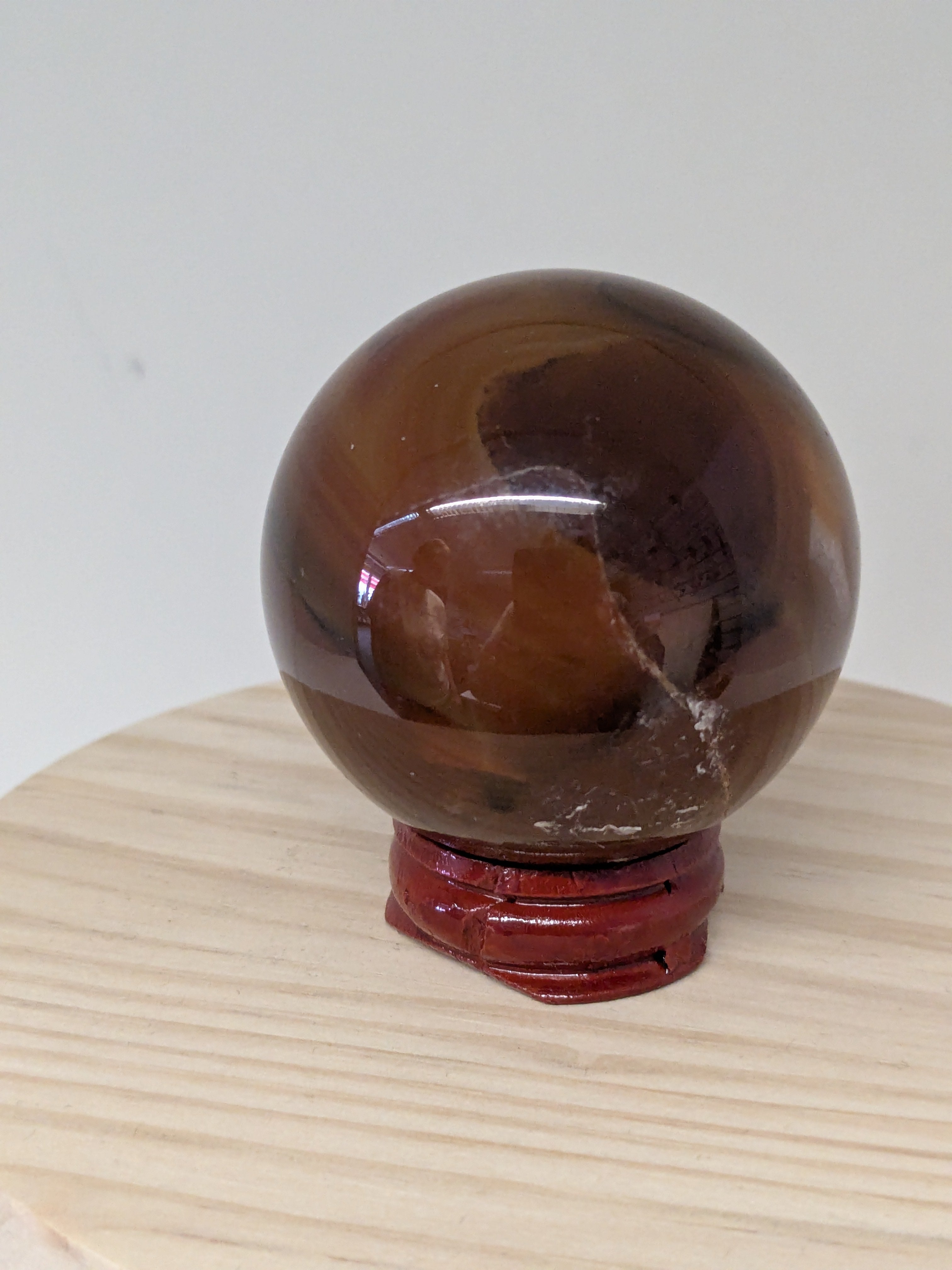 Carnelian Crystal Sphere with Wooden Stand