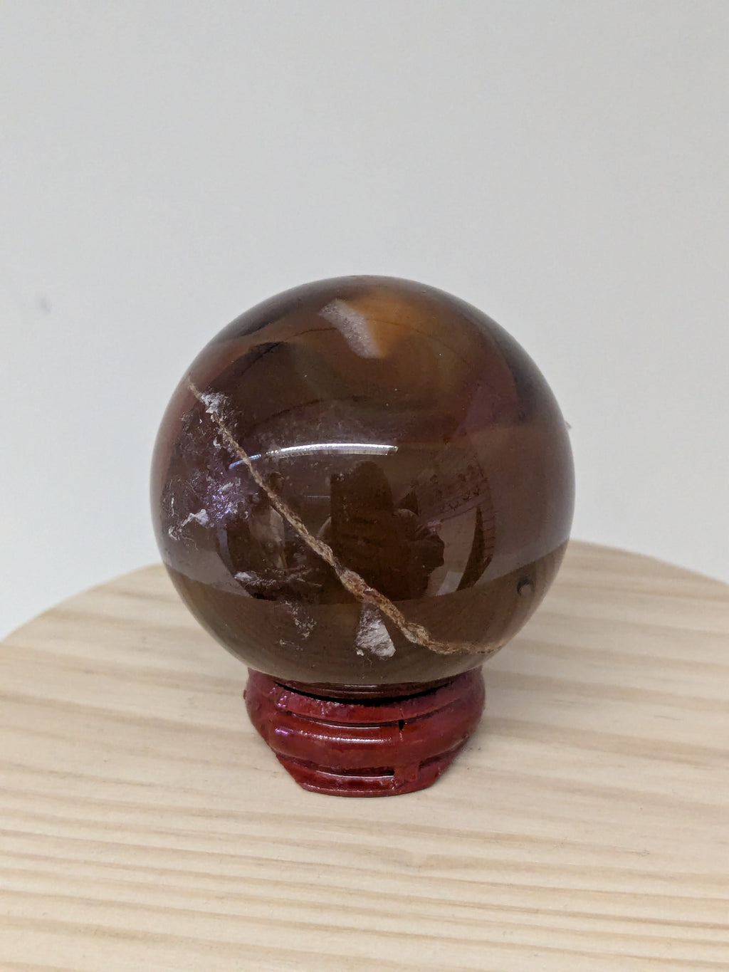 Carnelian Crystal Sphere with Wooden Stand