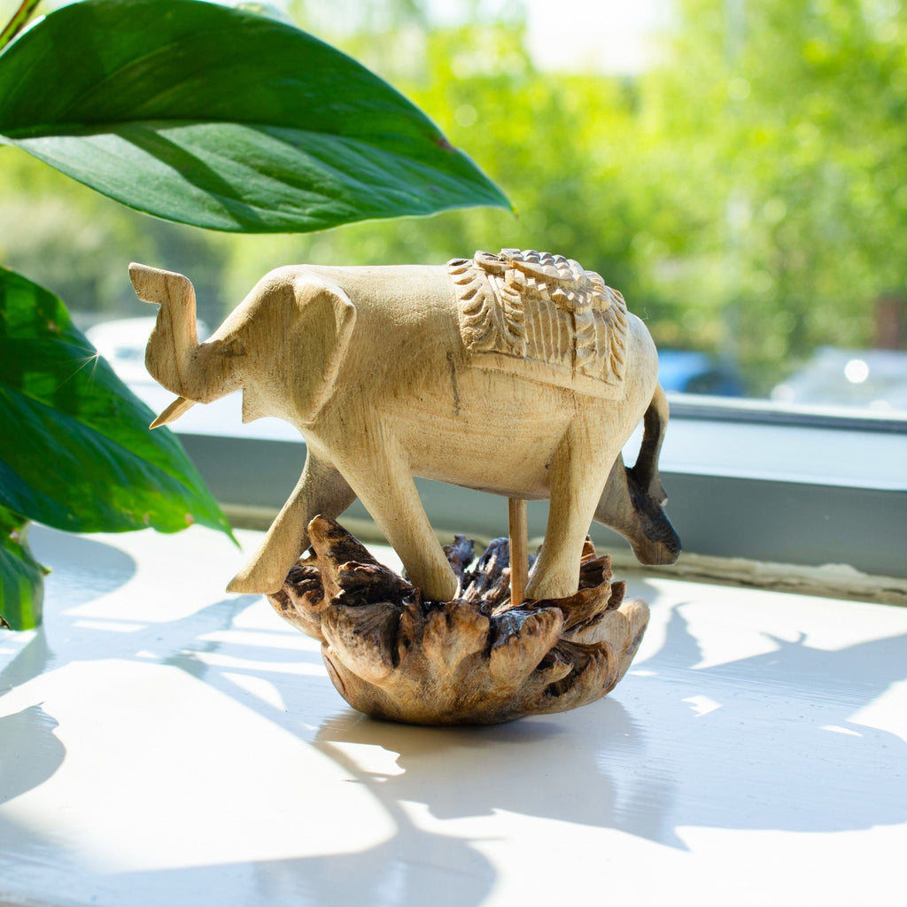 Hand-Carved Wooden Elephant Statue on Parasite Wood Base