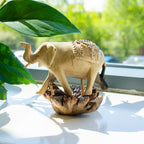 Hand-Carved Wooden Elephant Statue on Parasite Wood Base